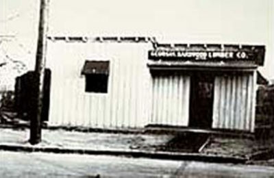 a white building with a door open