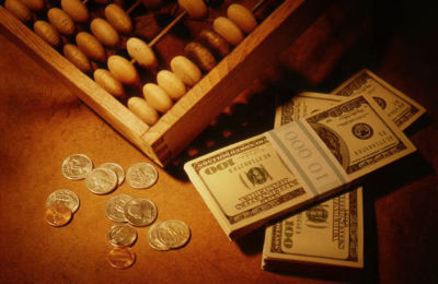 a stack of money and coins