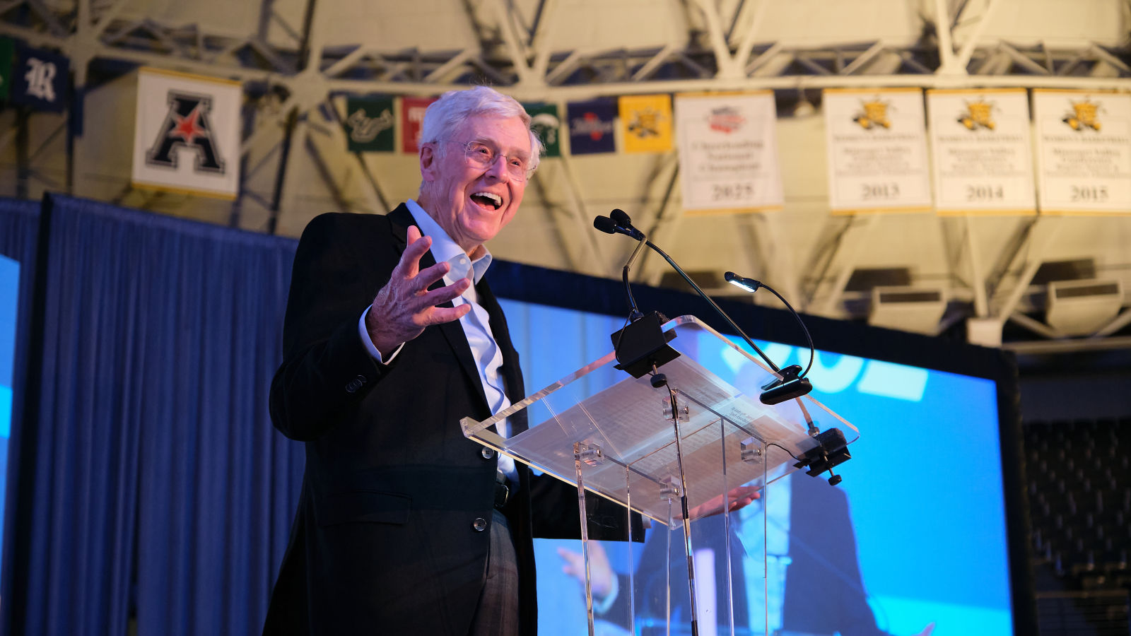 a man standing at a podium
