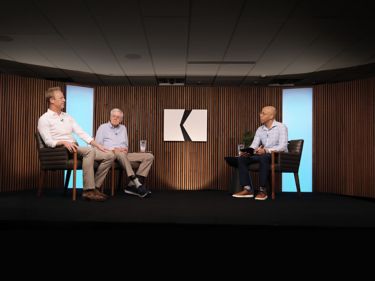 a group of men sitting in chairs
