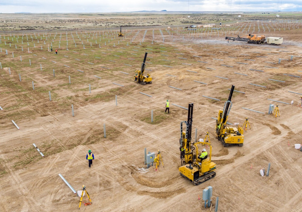 a group of construction workers in a field