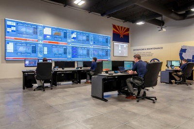 a group of people sitting at computers