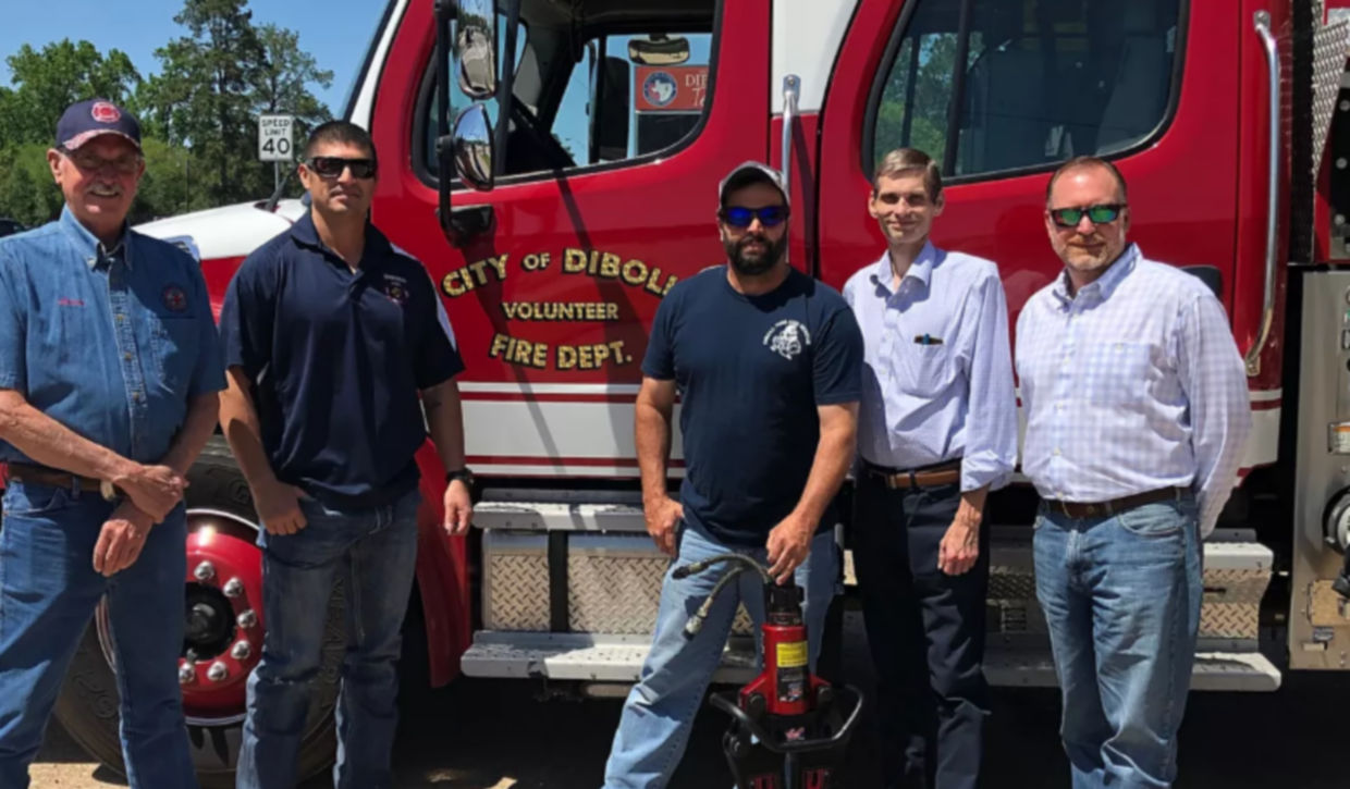 The Diboll Volunteer Fire Department partnered with Georgia-Pacific to help purchase the latest in Jaws of Life technology. From left to right are Diboll Volunteer Firefighters Reuben Terrazas, Larry Lucas, and Aaron Smith; Trey Wilkerson, Diboll Mayor; and Pat Aldred, Vice-President of Composite Panels for Georgia-Pacific.
