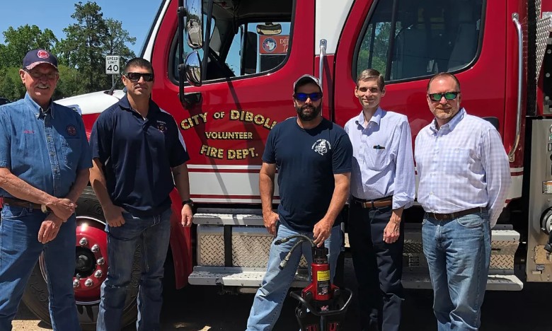 The Diboll Volunteer Fire Department partnered with Georgia-Pacific to help purchase the latest in Jaws of Life technology. From left to right are Diboll Volunteer Firefighters Reuben Terrazas, Larry Lucas, and Aaron Smith; Trey Wilkerson, Diboll Mayor; and Pat Aldred, Vice-President of Composite Panels for Georgia-Pacific.