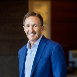 a man in a blue suit