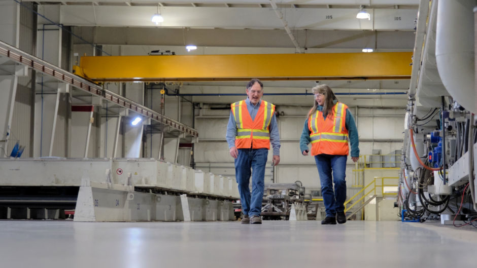a man and woman in a factory