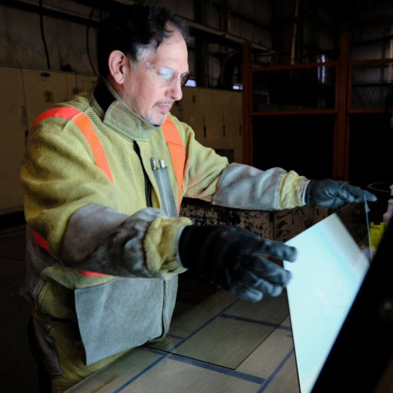 a man wearing safety gear and gloves
