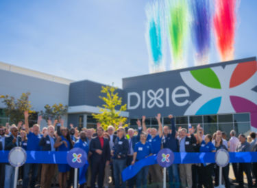 a group of people standing in front of a building