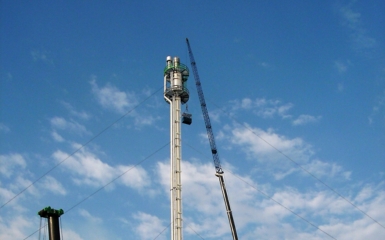 a crane lifting a tower