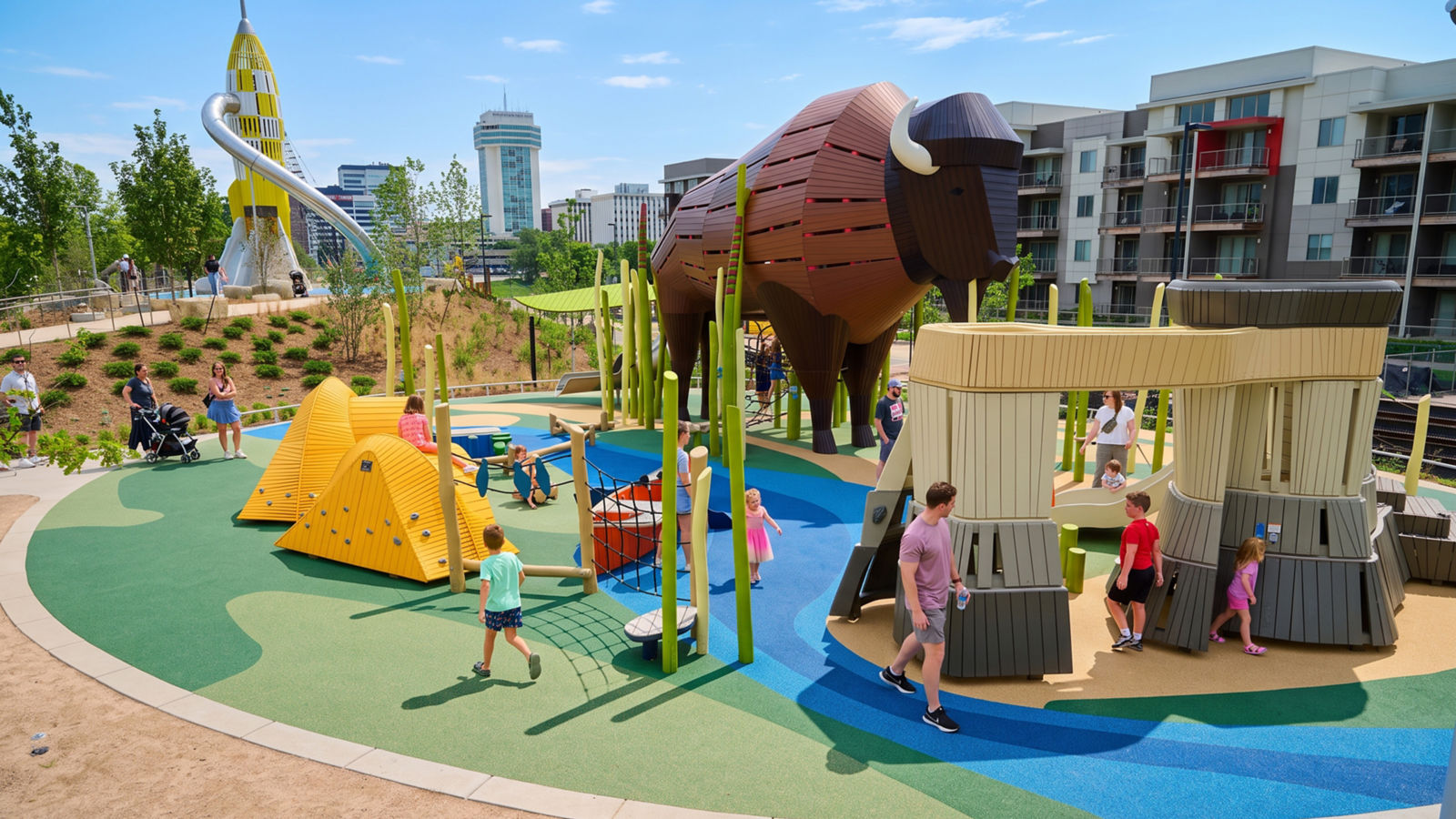 a group of kids playing at a playground