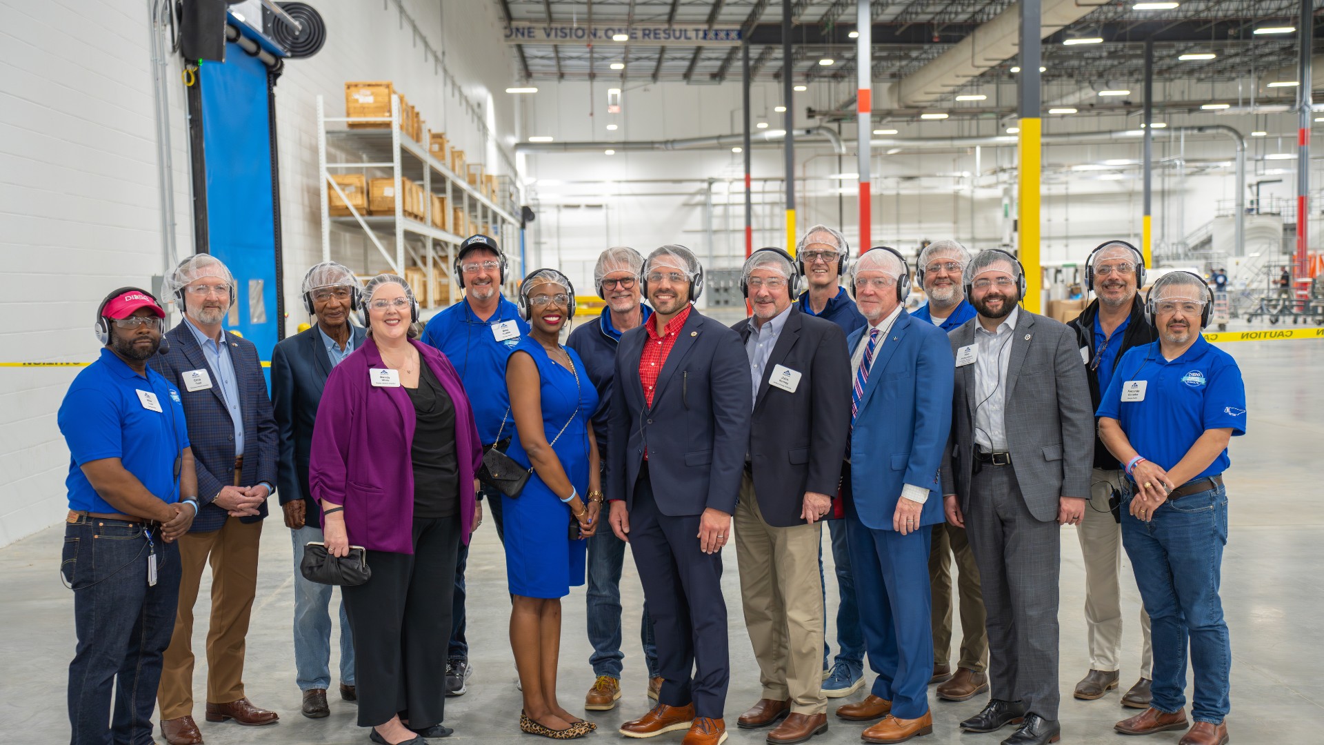 Employees, local and state officials for the state of Tennessee, and Georgia-Pacific and Dixie executive leadership are pictured in the new facility in Jackson, Tennessee. 
