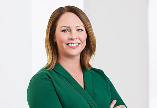 a woman in a green shirt