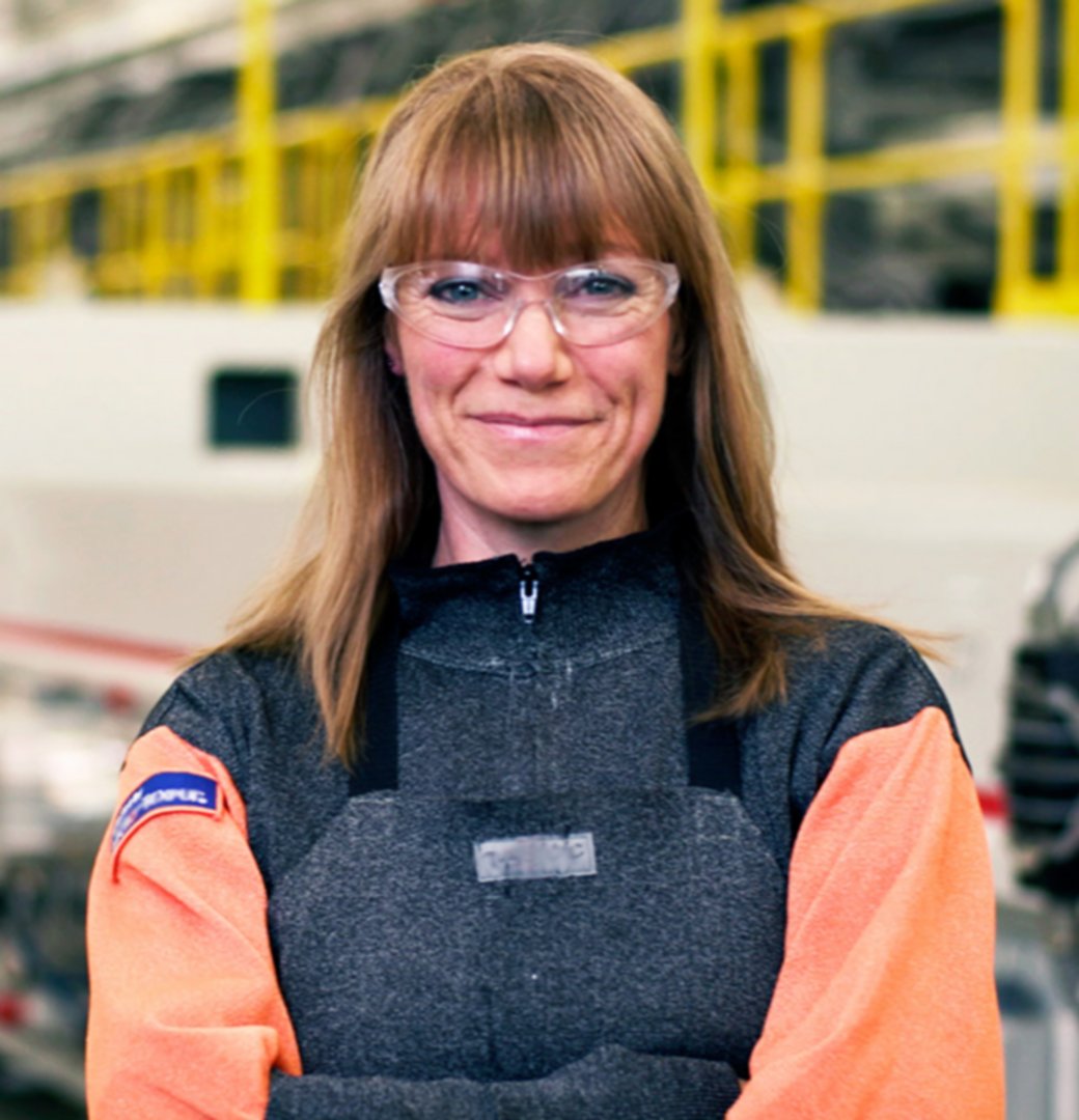Woman in glass factory