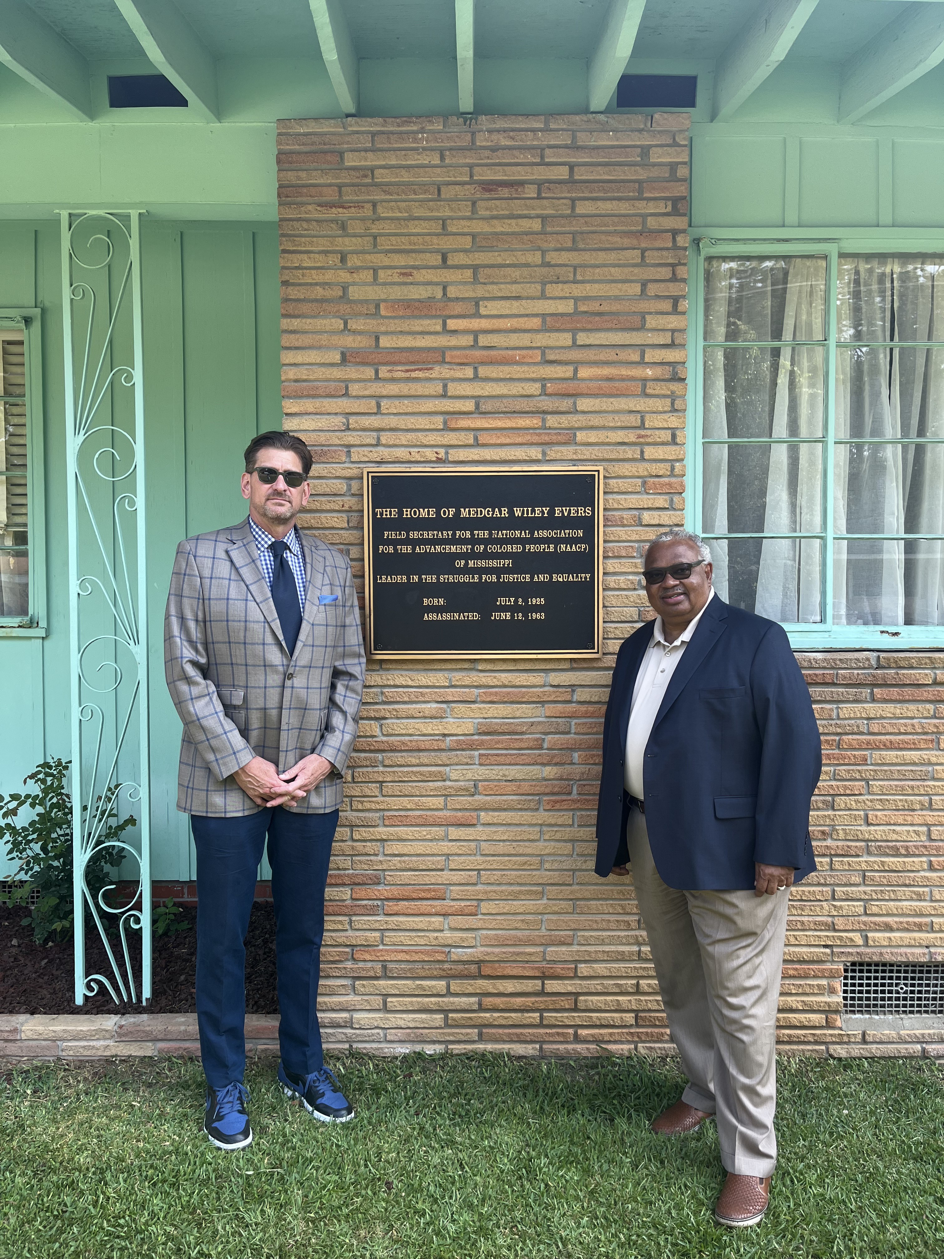 Chris Graham, senior vice president of compliance and ethics and member of the Georgia Advisory Board for the Trust for Public Land, and Curley Dossman, vice president of community relations, are pictured in front of the Medgar and Myrlie Evers Home in Jackson Mississippi.
