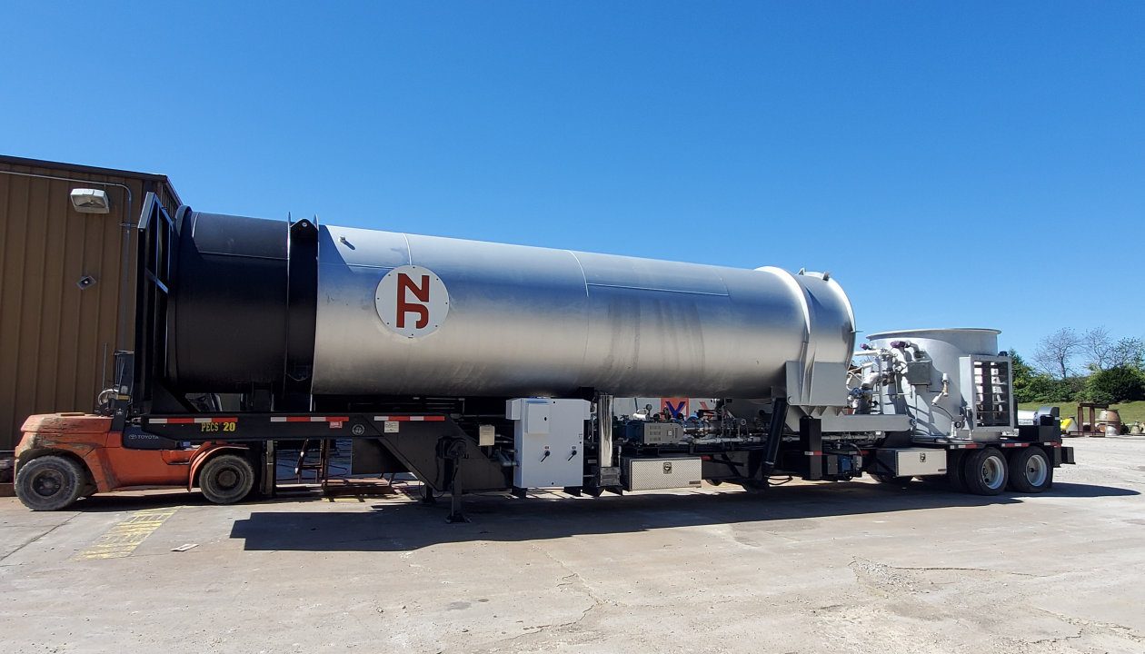a large silver tanker truck