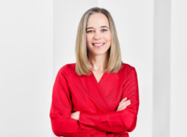 a woman in a red shirt