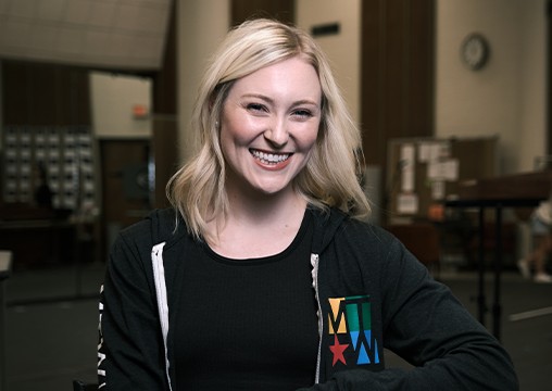 a woman smiling at camera