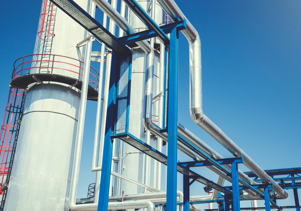 a blue and white pipes on a blue sky