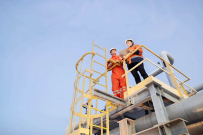 a few people standing on a platform