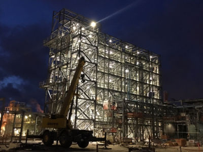a building under construction at night