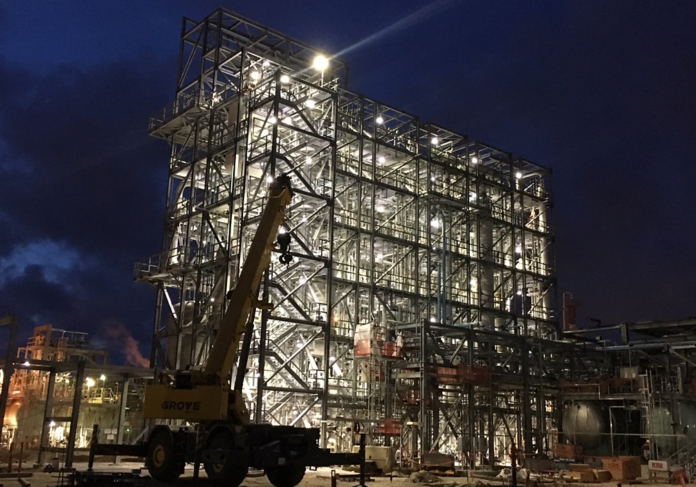 a building under construction at night