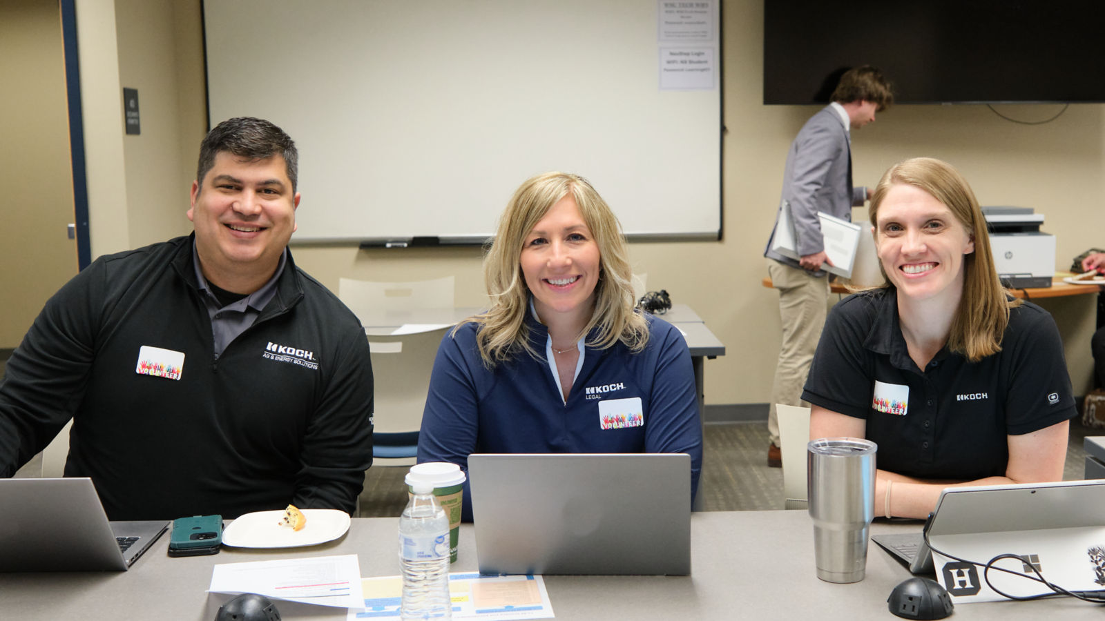 a group of people sitting at a table
