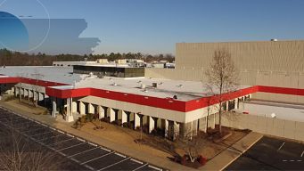 a building with a parking lot