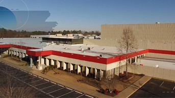 a building with a parking lot