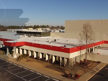 a building with a parking lot