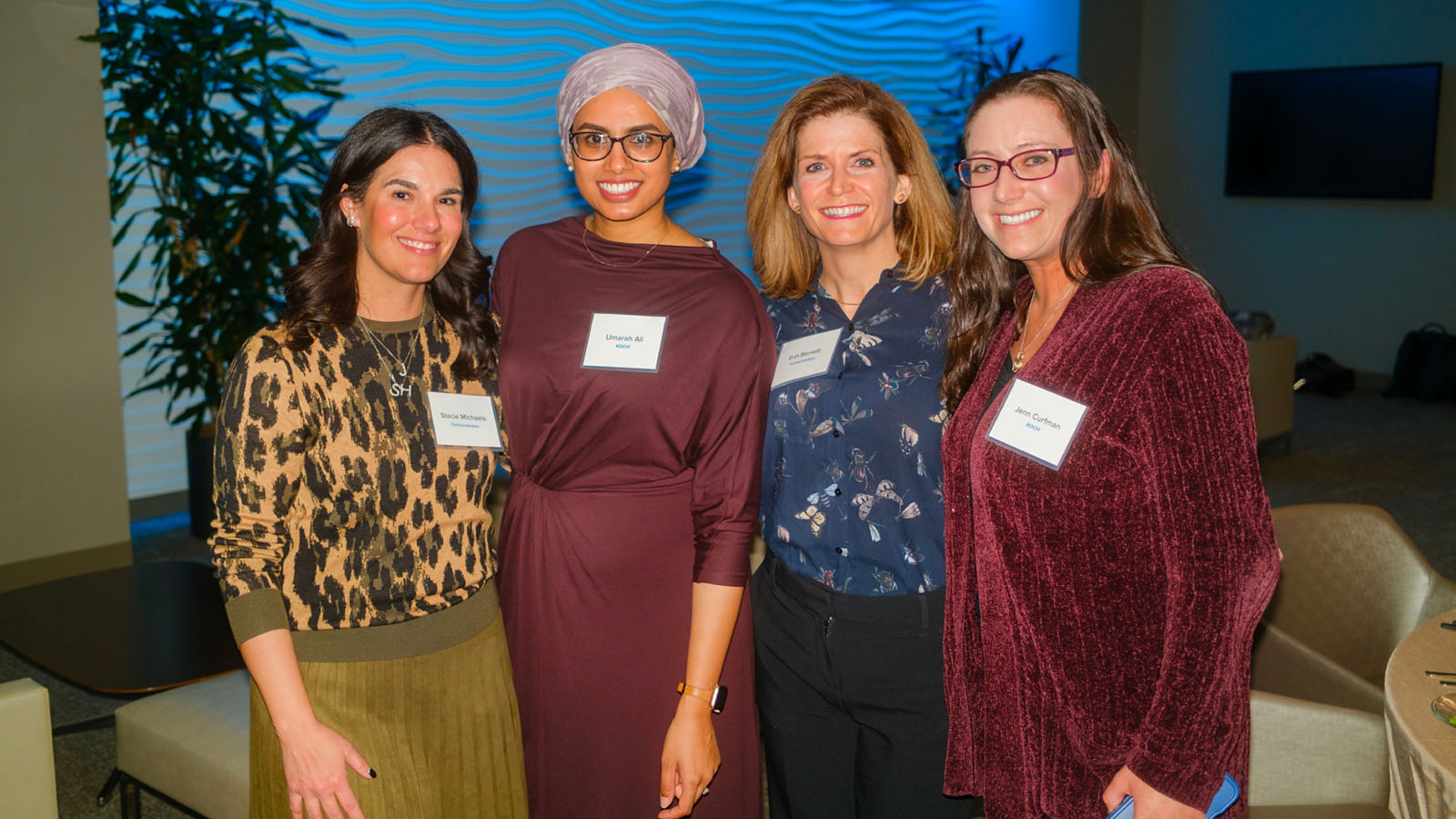 a group of women posing for a photo