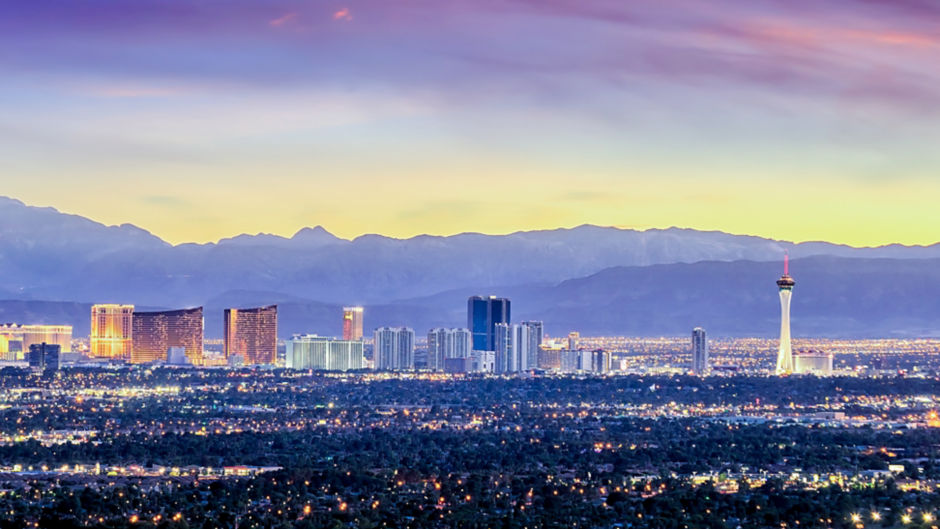 a city with lights in the background