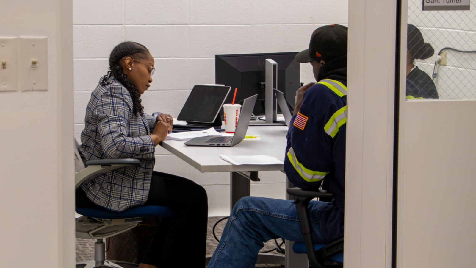 a man and woman sitting at a table