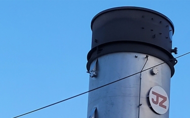 a close up of a metal tower