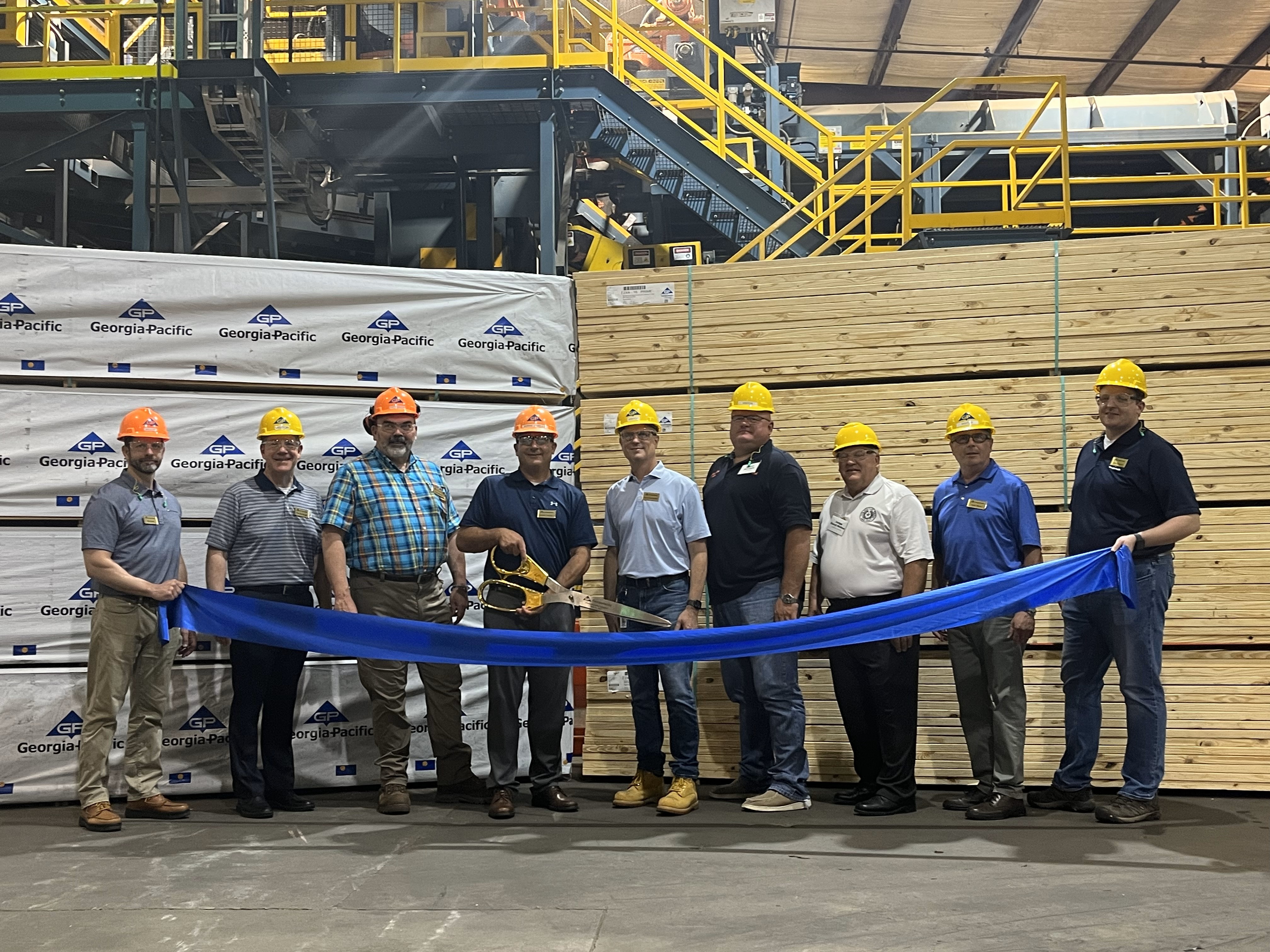 Georgia-Pacific cuts the ribbon on the largest sawmill in the south, Pineland Lumber. Featured are Georgia-Pacific leadership and state and local government officials.