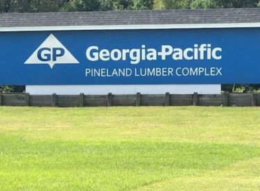 GP sign over fresh cut grass on sunny morning 