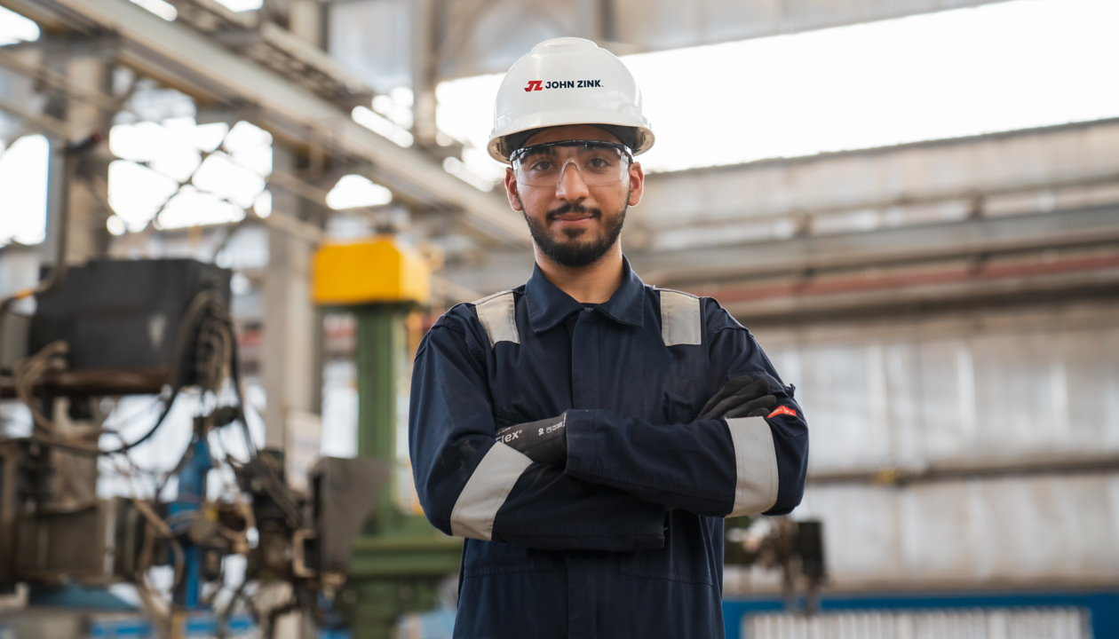 a man wearing a hard hat and hard hat