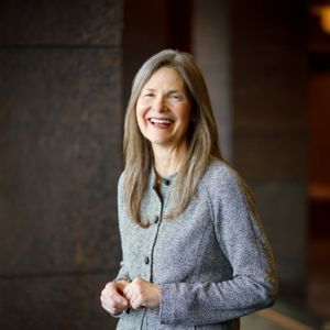 a woman smiling at the camera