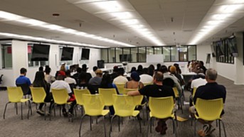 a group of people sitting in a room