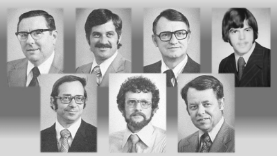 a group of men wearing suits and ties