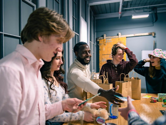 a group of people sitting at a table