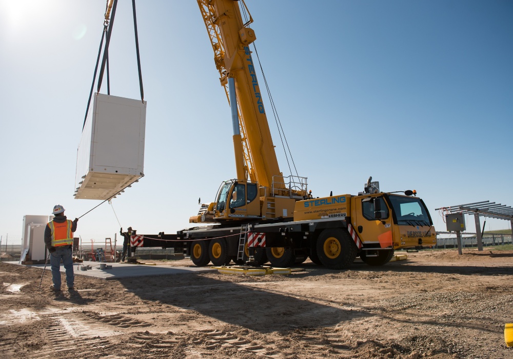 a crane lifting a box