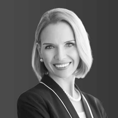 a woman smiling at the camera