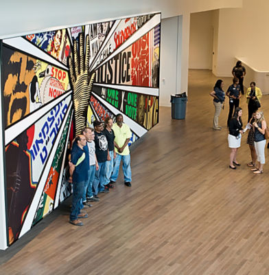 a group of people standing in a room