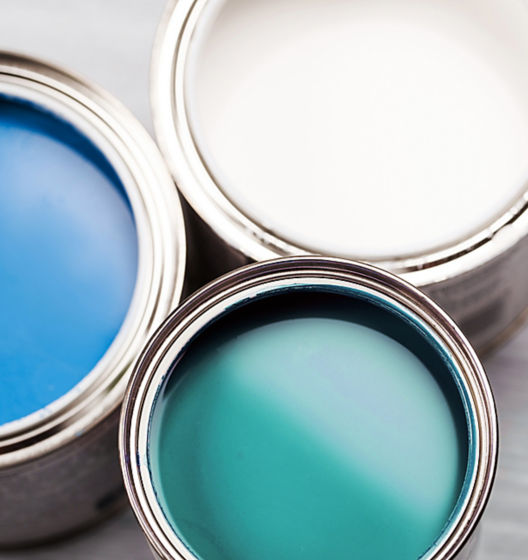 a group of paint cans