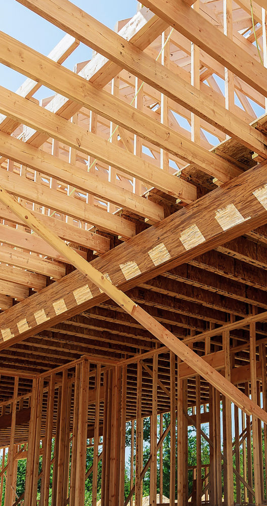 a wood frame of a house under construction