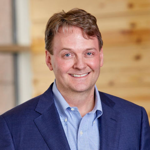 a man in a blue suit