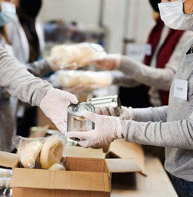 a group of people wearing masks and gloves