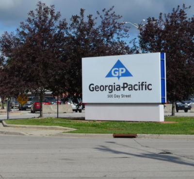 a sign board with a blue and black text