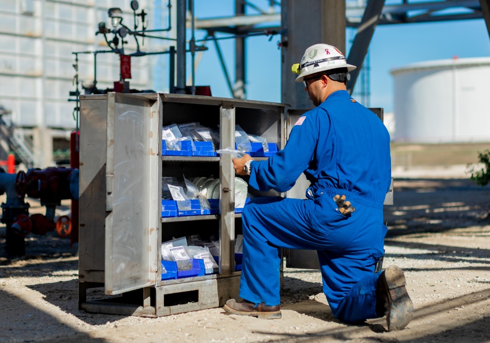 a man in a blue jumpsuit