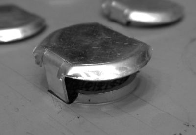 a close-up of a metal cap